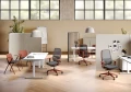 Ergonomiczne stanowisko pracy w biurze wyposażone w konfigurowalny fotel TIME od Intar Seating.webp